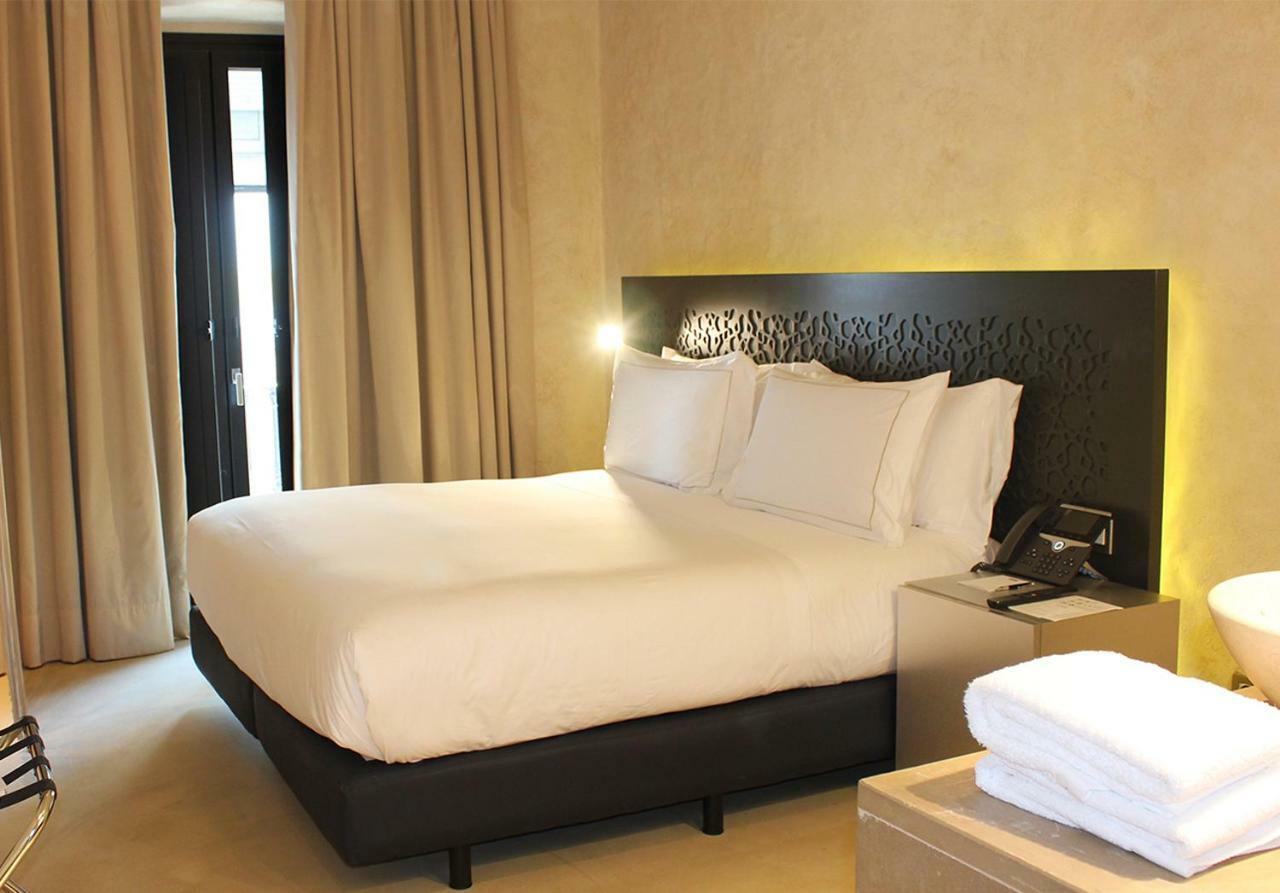 Eme Catedral Mercer Hotel Sevilla Exteriér fotografie A bedroom at the hotel