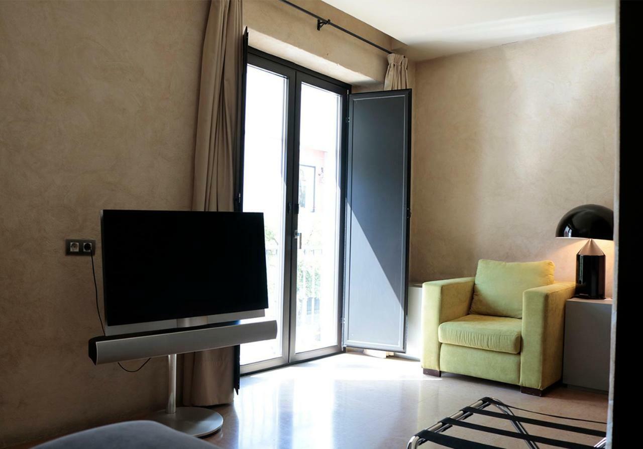 Eme Catedral Mercer Hotel Sevilla Exteriér fotografie A room at the hotel
