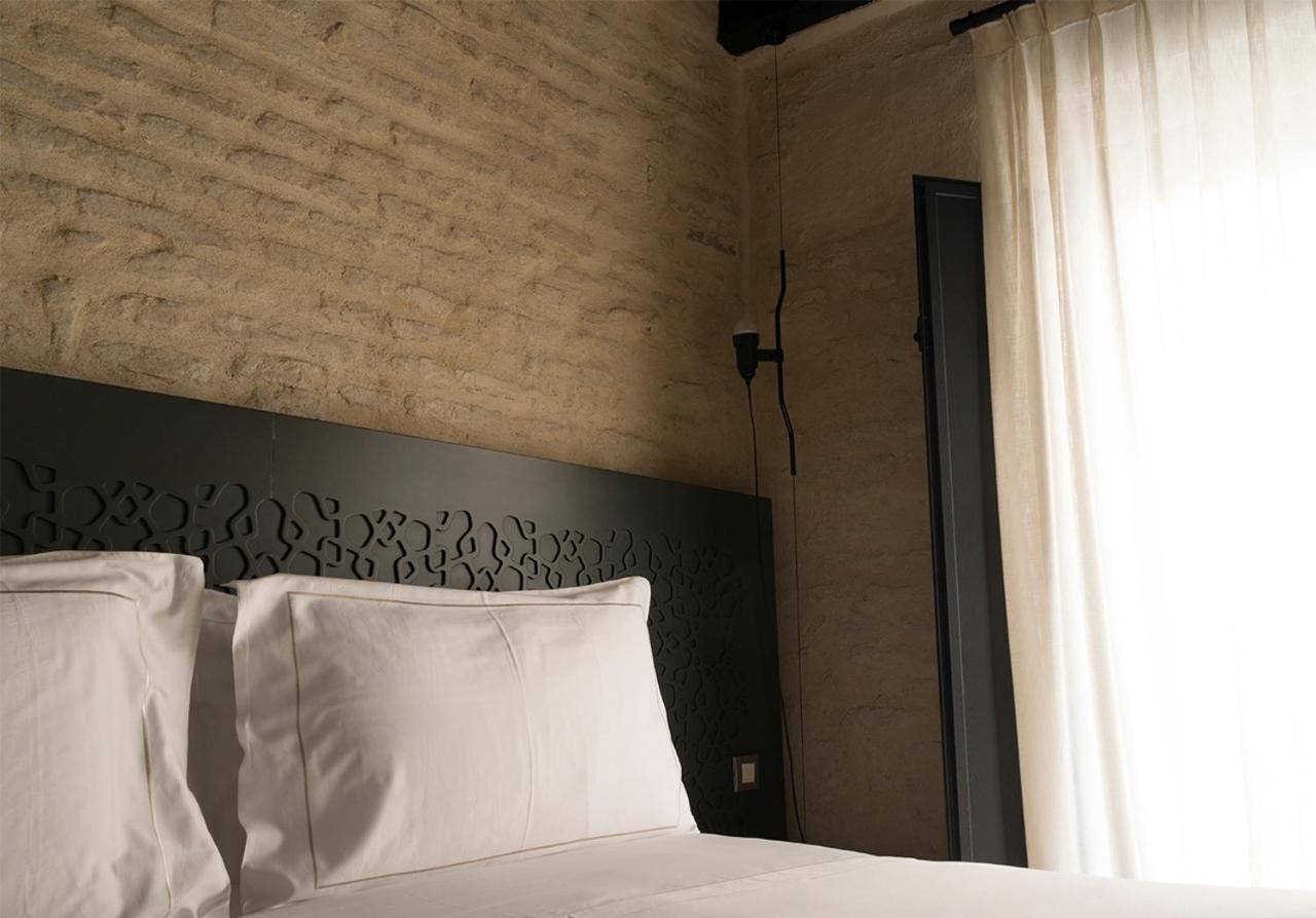 Eme Catedral Mercer Hotel Sevilla Exteriér fotografie A bedroom at the hotel